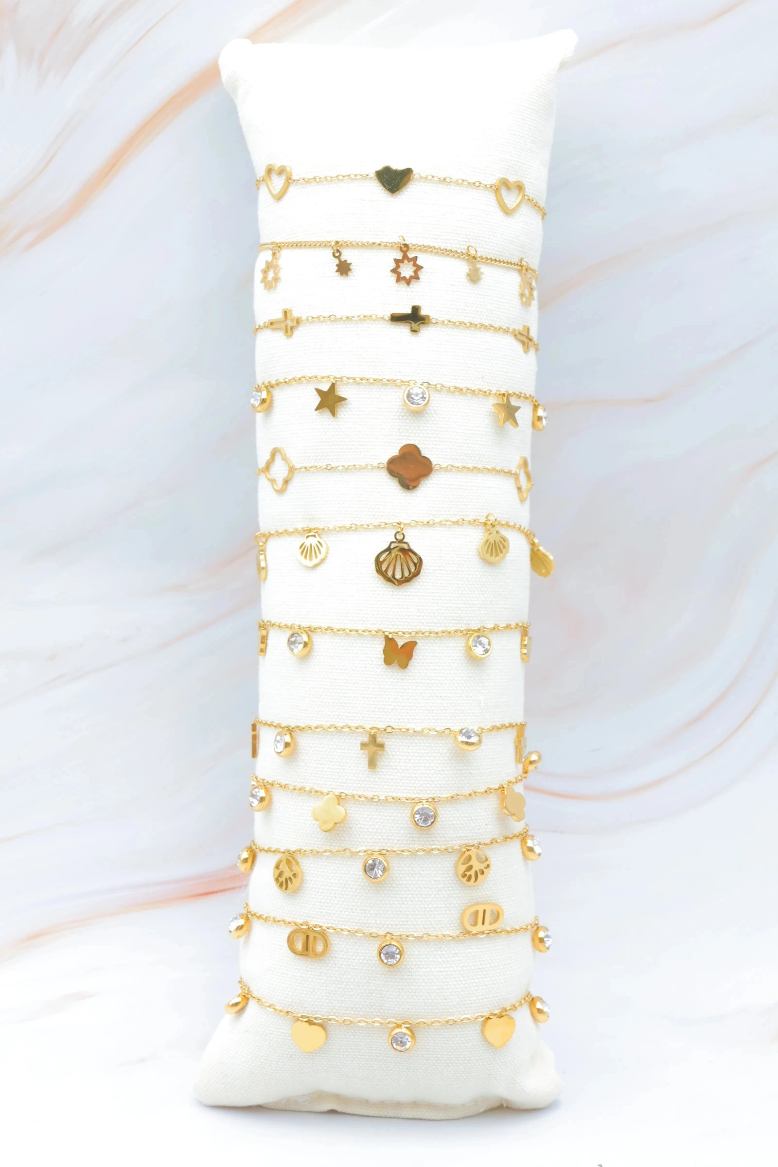 Grossiste Bijoux Mystères - Lot de 12 bracelets en acier inoxydable avec coussin inclus