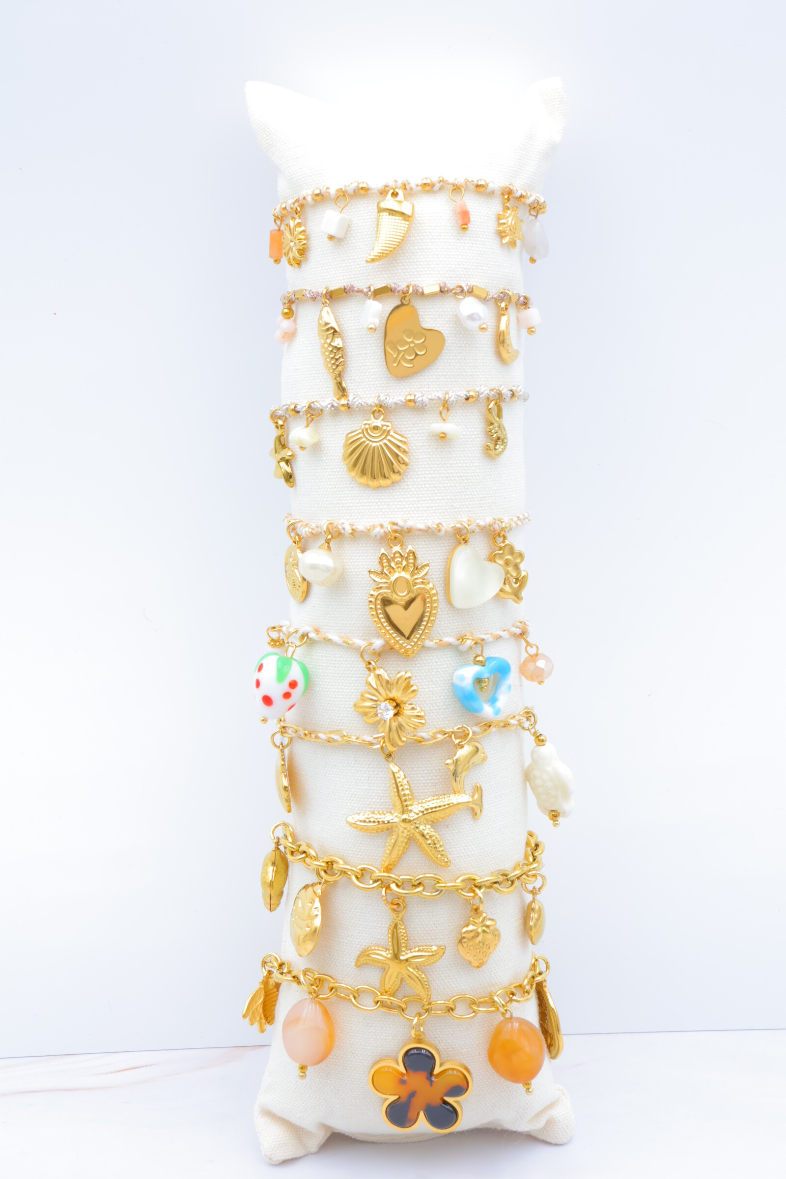 Grossista Bijoux Mystères - Set di 8 bracciali in acciaio inossidabile con cuscino