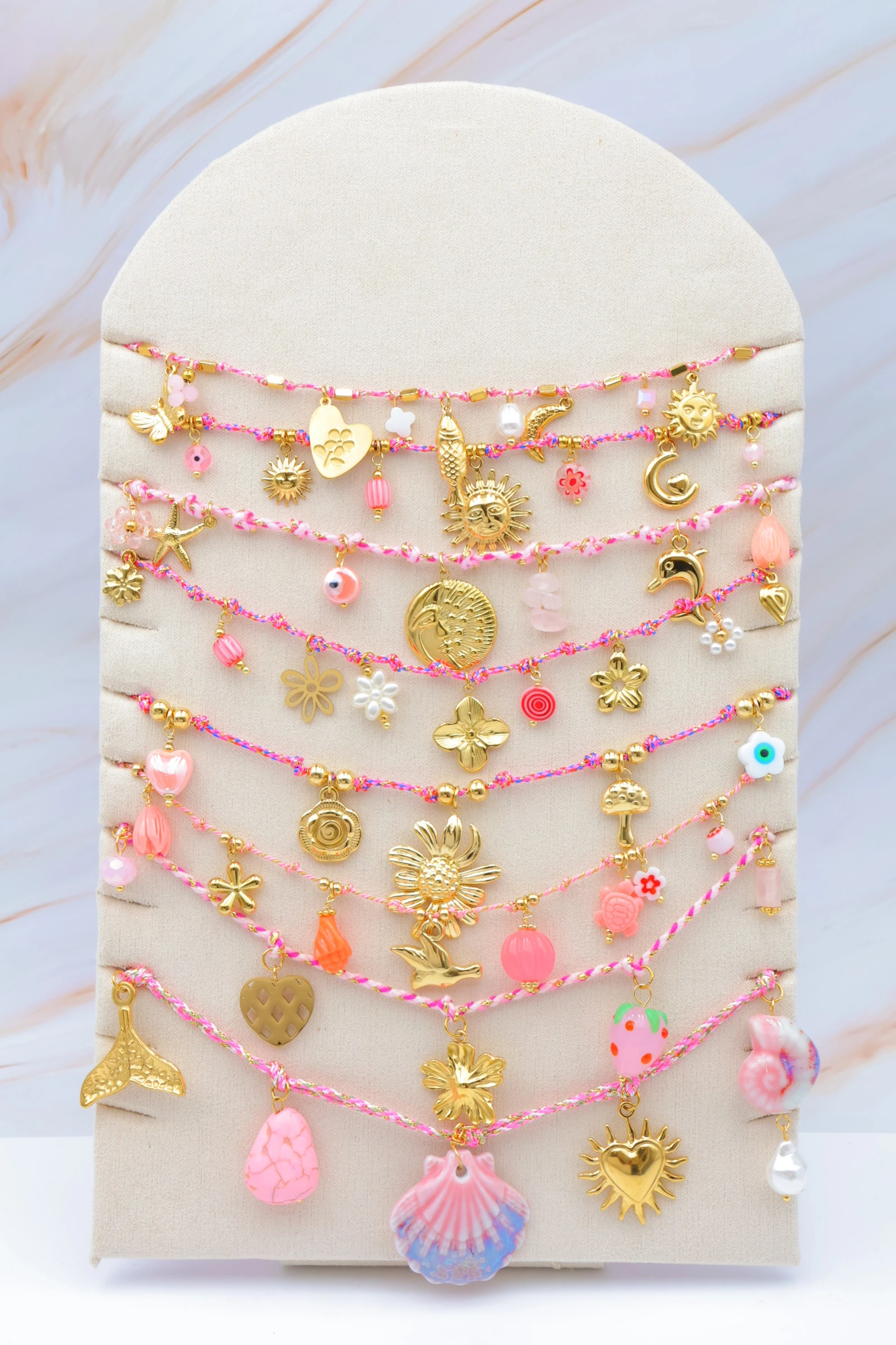 Grossiste Bijoux Mystères - Lot de 8 colliers en acier inoxydable avec présentoir