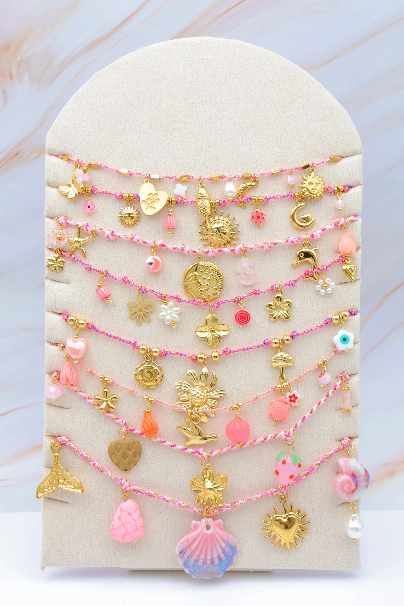 Mayorista Bijoux Mystères - Juego de 8 collares de acero inoxidable con expositor.