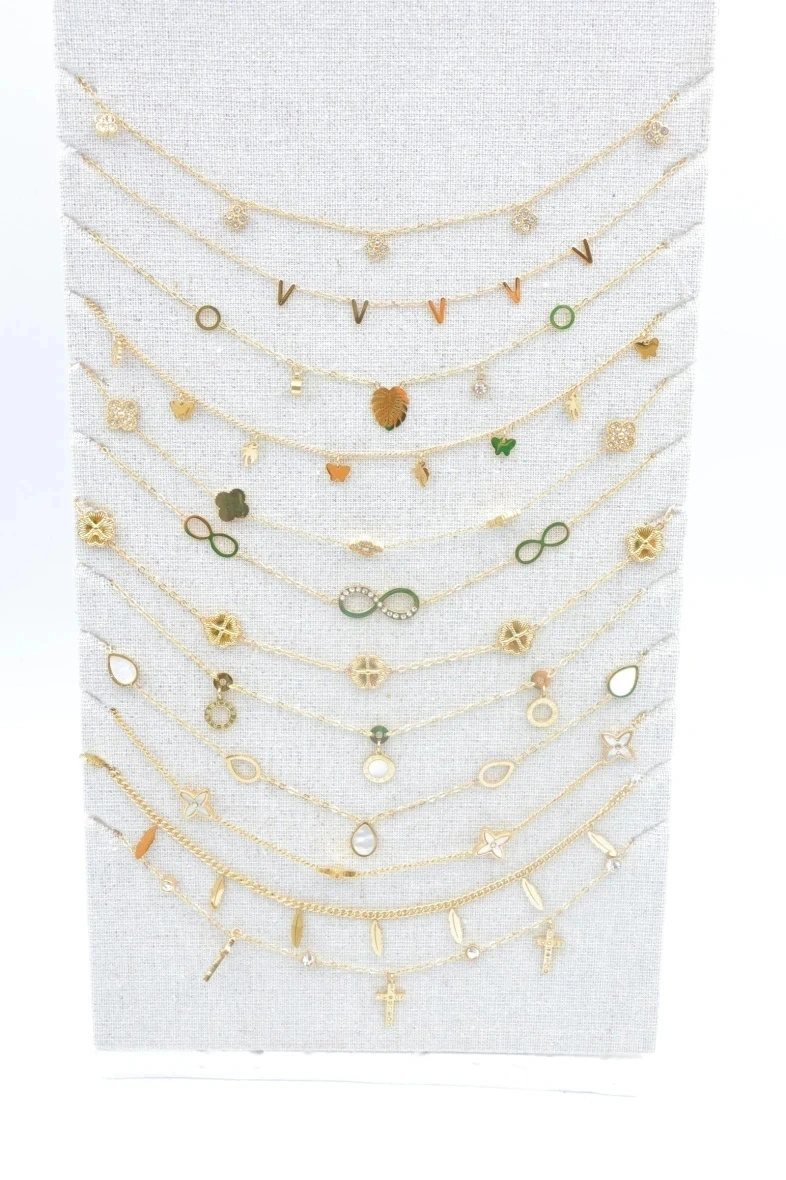 Grossiste Bijoux Mystères - Lot de 12 colliers en acier inoxydable avec présentoir