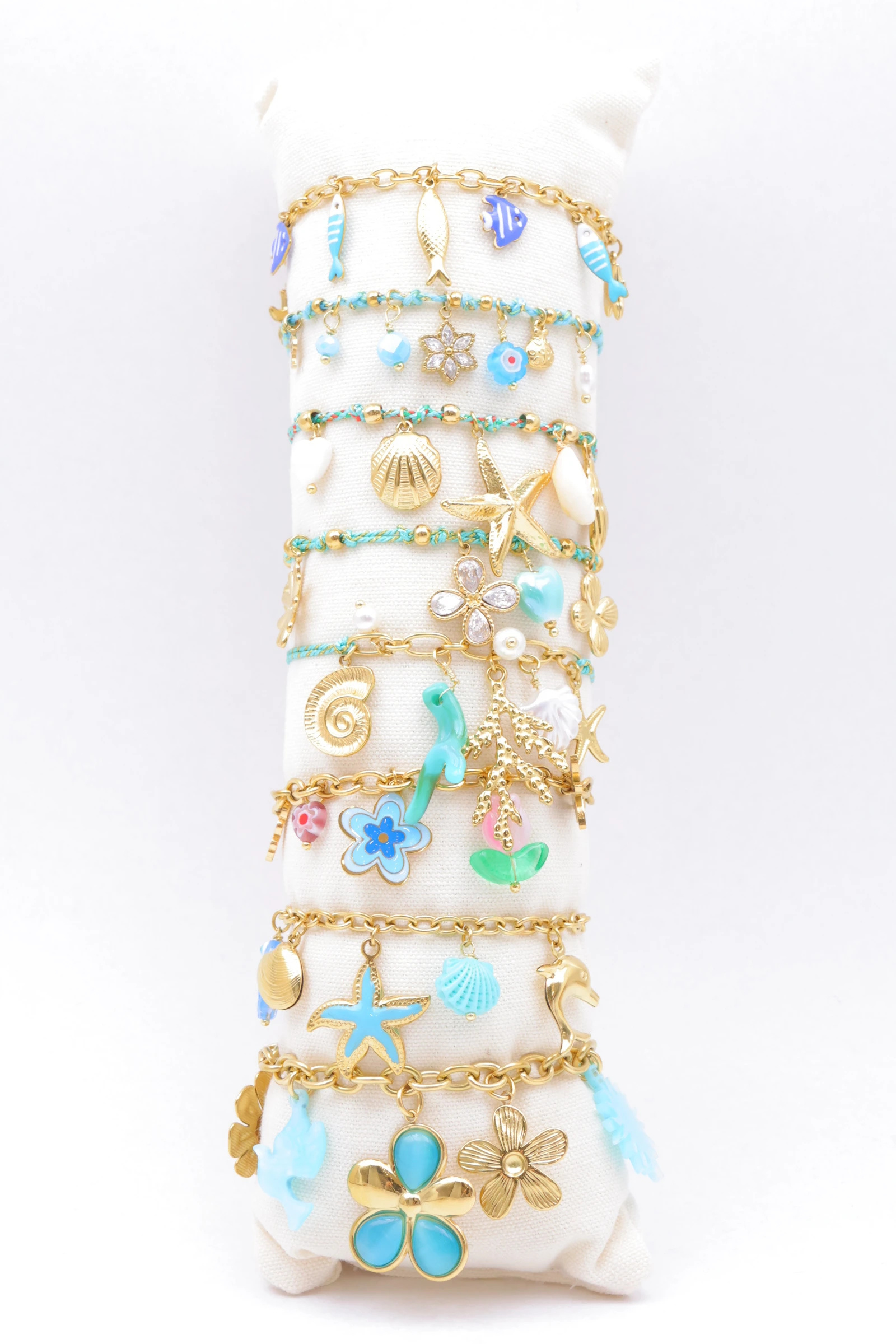 Mayorista Bijoux Mystères - Juego de 8 pulseras de acero inoxidable con cojín.
