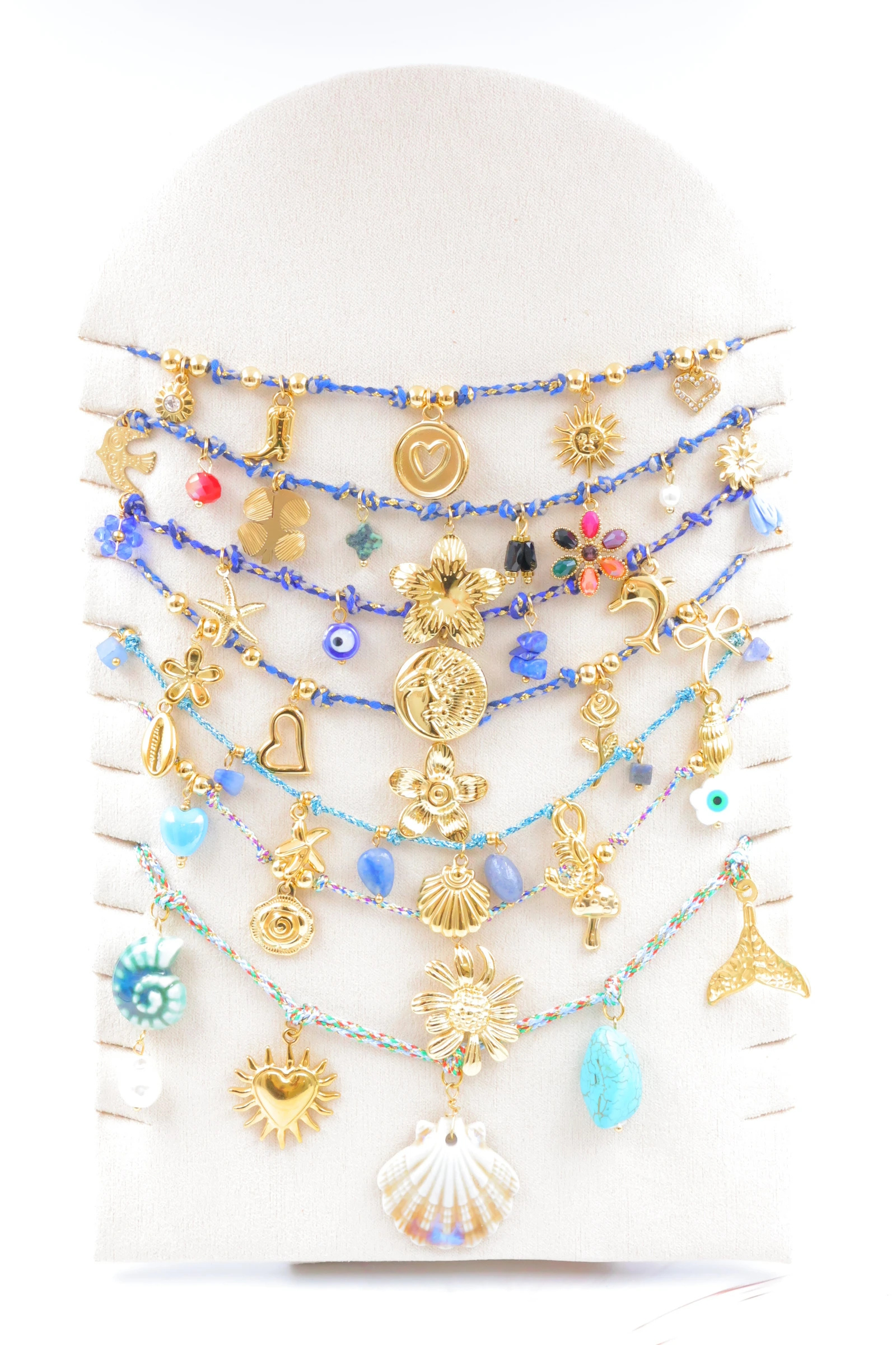 Grossiste Bijoux Mystères - Lot de 7 colliers en acier inoxydable avec présentoir