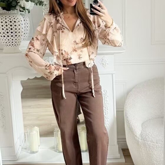 Beige ruffled polyester blouse, lightweight for spring/summer, made in China, perfect for a chic look.