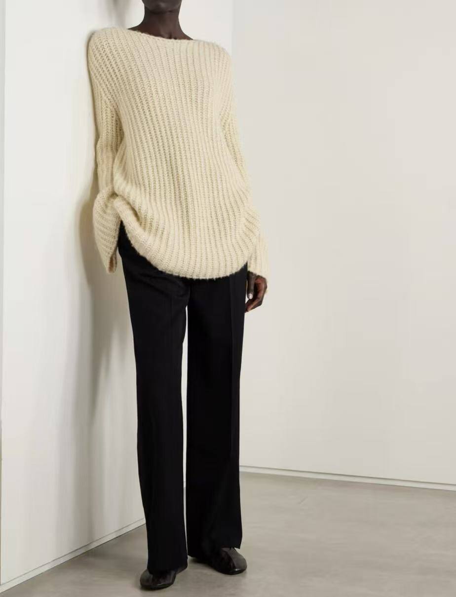 Women's oversized sweater, soft ribbed knit, 75% acrylic, perfect for spring. Made in China, ideal for a casual look.