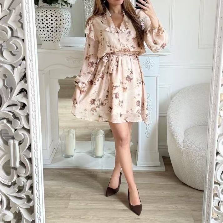 Beige floral polyester dress, perfect for spring/summer, made in China. Ideal for welcoming the new season in style.