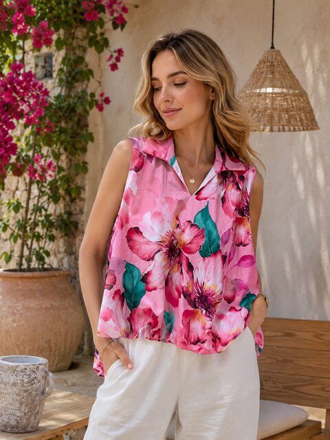 Grossiste Bluoltre - Blouse sans manches à imprimé floral. Tissu léger et fluide en coton, col chemise et coupe ample pour un style estival et décontracté.