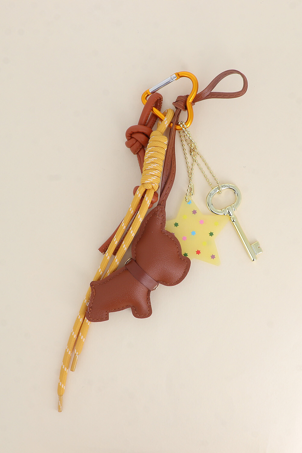 Grossiste Bohm - Grigri de sac - chien, étoile, clef, noeud, lacet