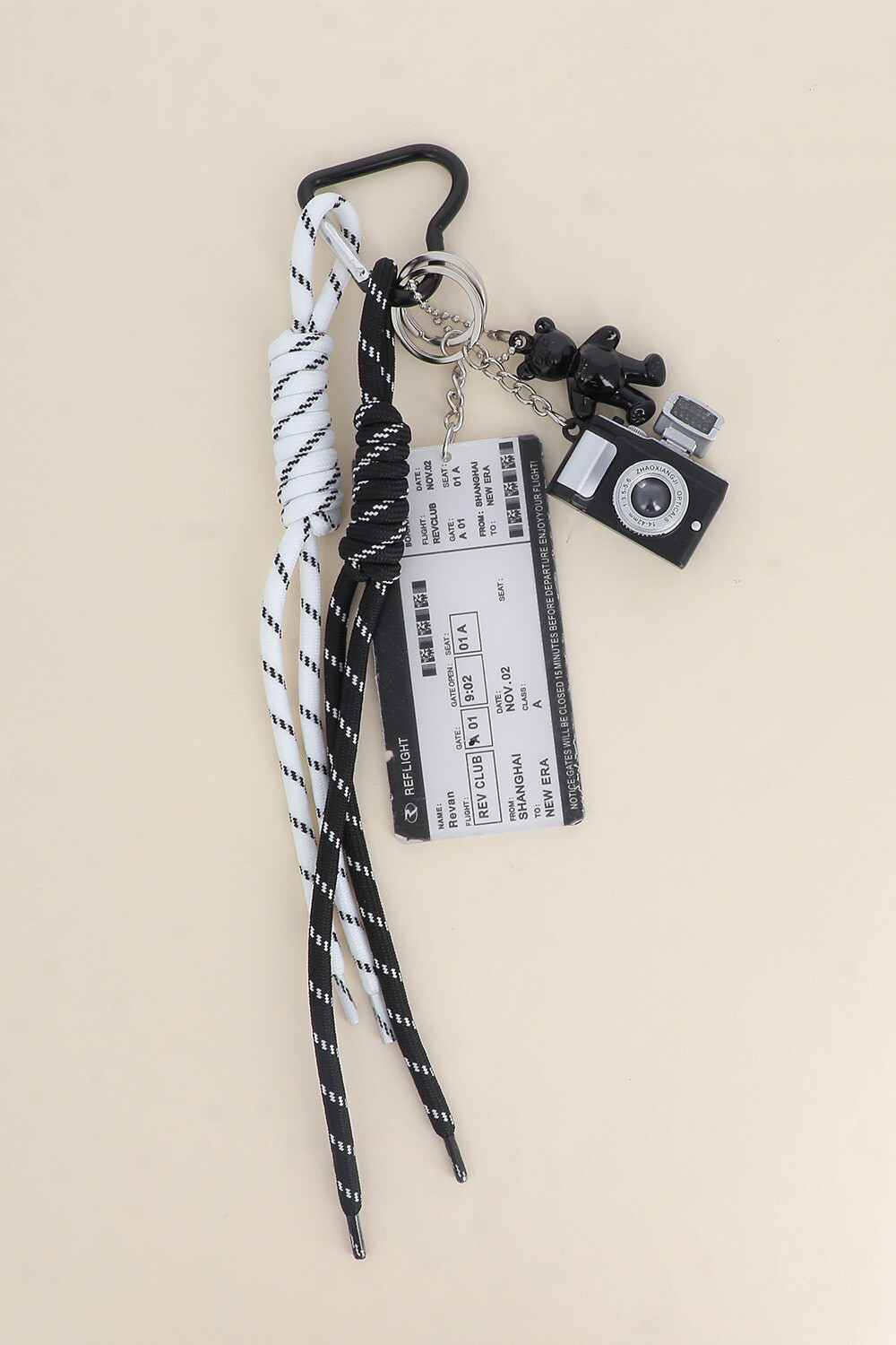 Grossiste Bohm - Grigri de sac - appareil photo, ticket d'embarquement, lacets, ourson