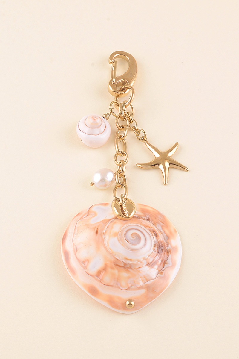 Großhändler Bohm - Schlüsselanhänger - natürliche Muscheln, Kaurischnecke, Seestern und Süßwasserperle