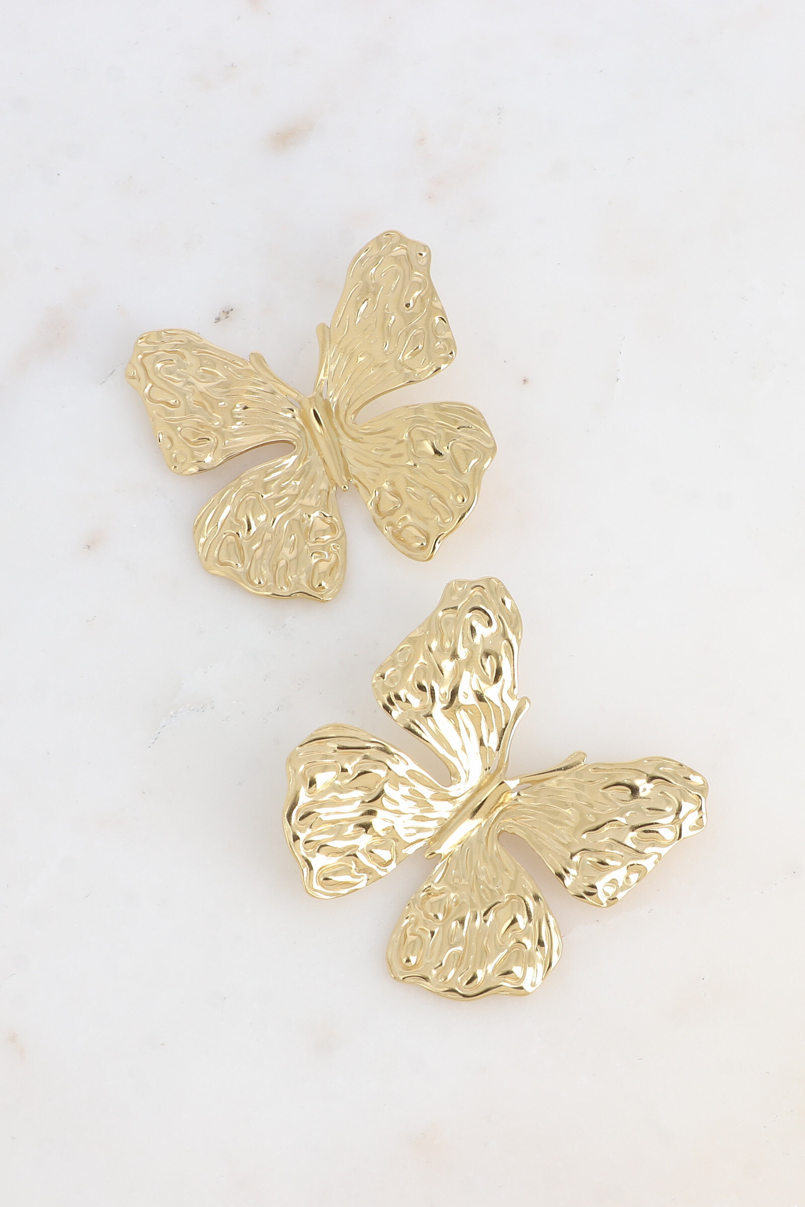 Grossiste Bohm - Boucles puces - grand papillon texturé