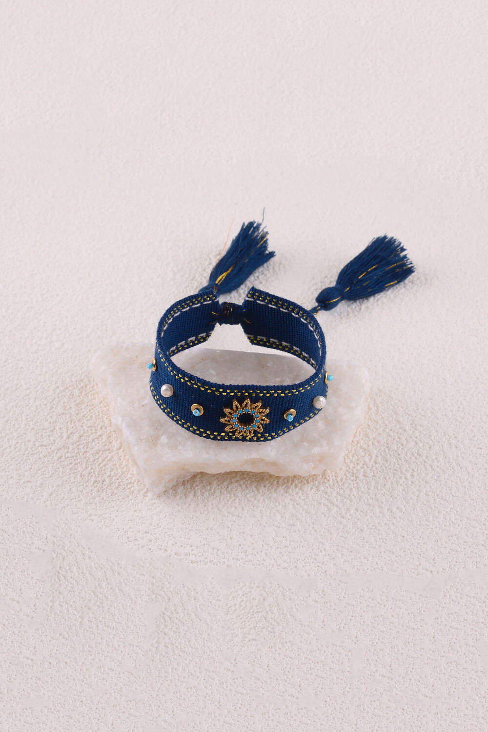 Grossista Bohm - Bracciale in tessuto scorrevole - Sole e ossidi di zirconio, pompon