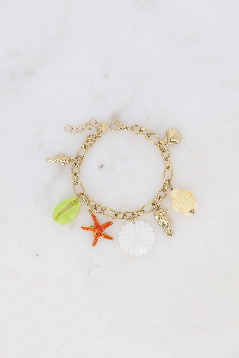 Grossiste Bohm - Bracelet - fleur nacrée, étoile de mer, tortue et cauri émaillés, coquillages