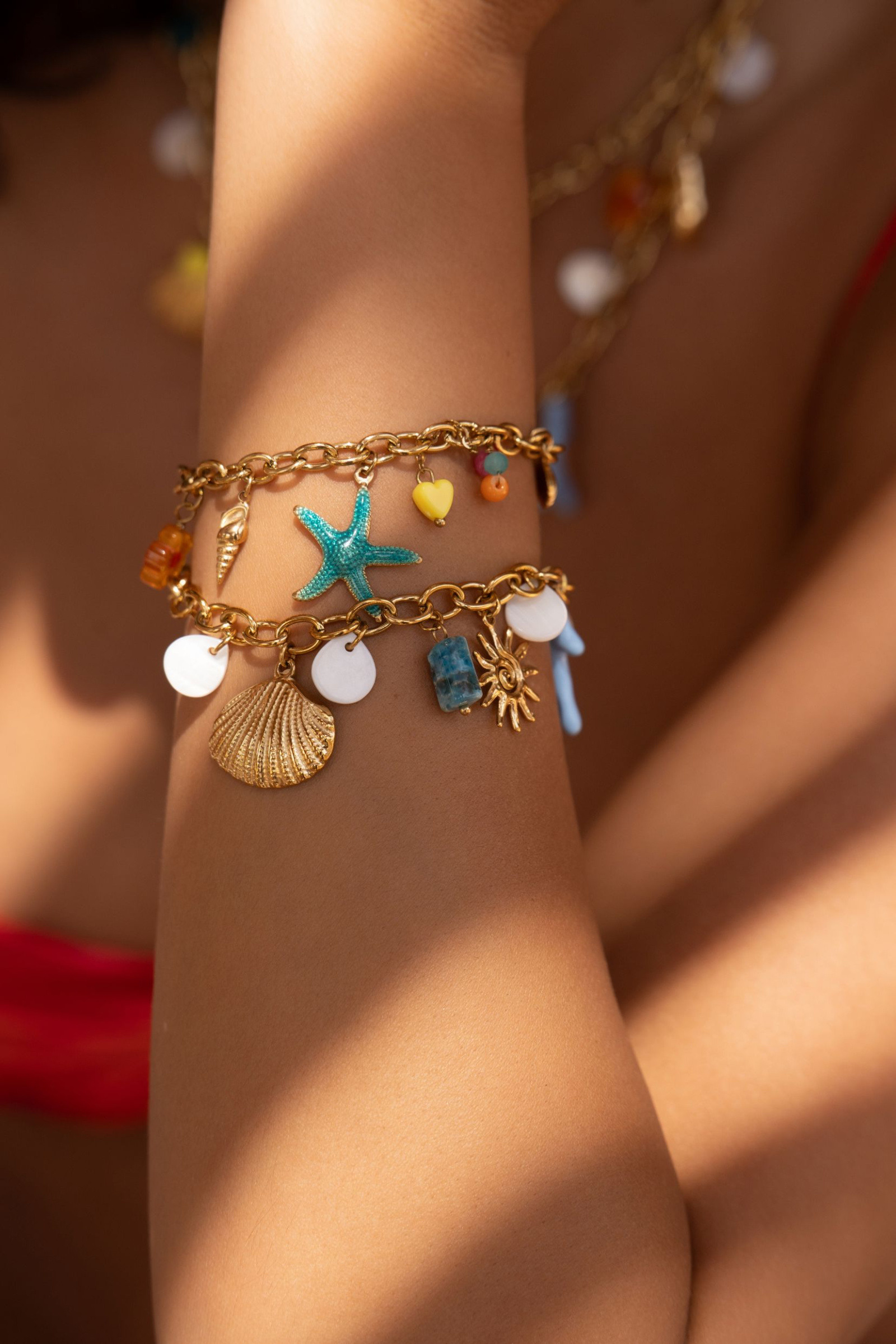 Grossiste Bohm - Bracelet - étoile de mer émaillée, coquillages, coeur, fleur, pâtes de verre