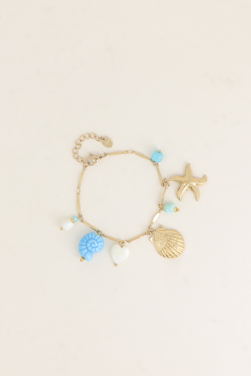 Grossista Bohm - Bracciale con ciondoli - (conchiglie, cuore in madreperla, ceramica smaltata, pietre naturali)