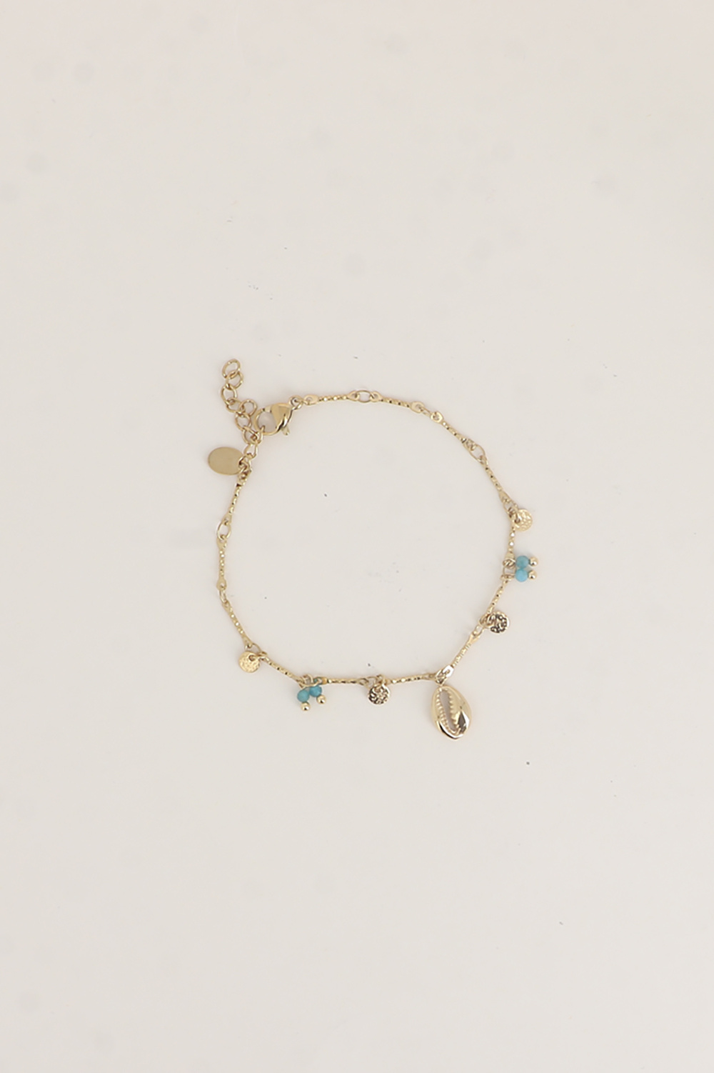 Wholesaler Bohm - Bracelet - hammered round discs, natural stones, and cowrie shell pendant