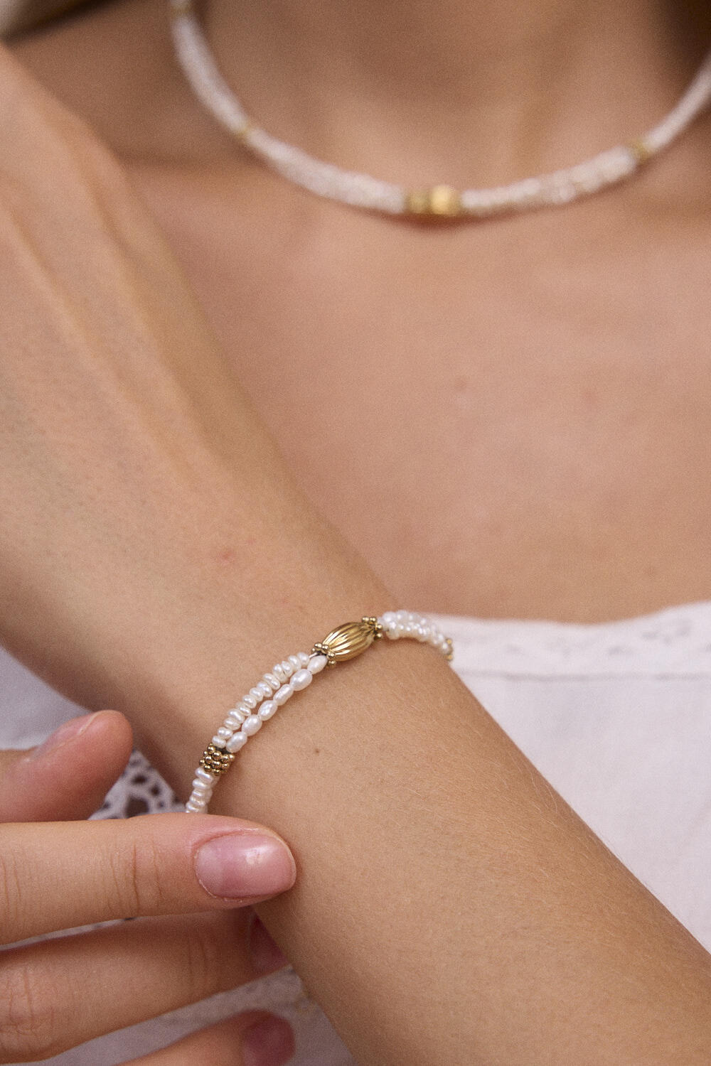 Großhändler Bohm - Armband - Edelstahlperlen, Süßwasserperlen und gestreifte ovale Perle