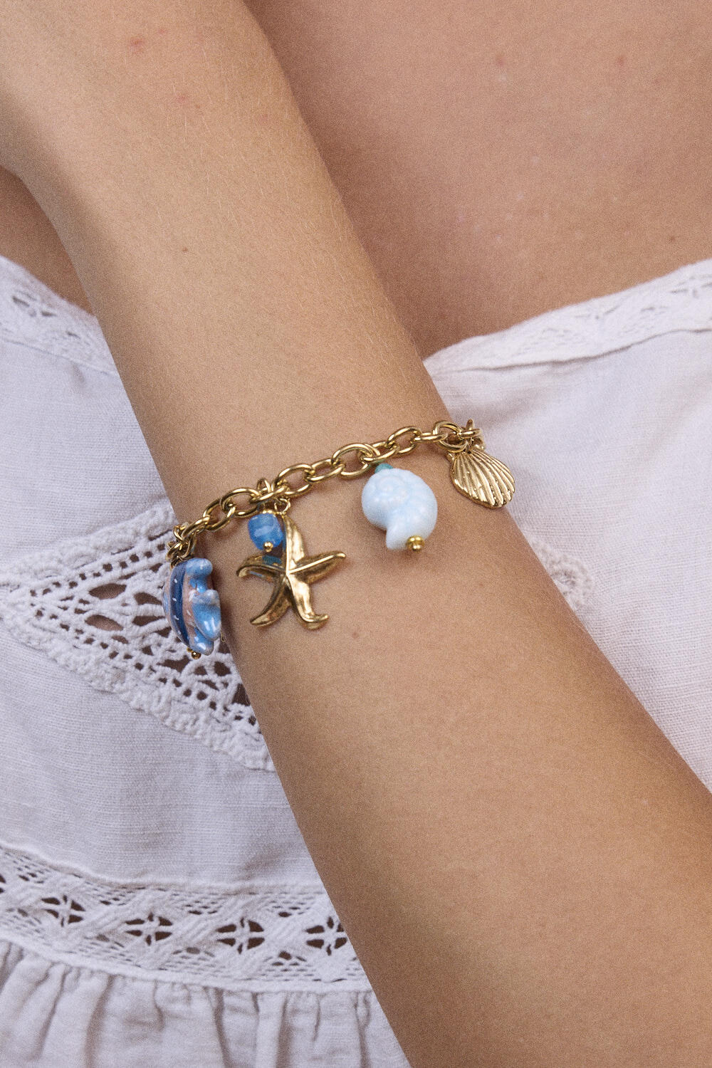 Grossista Bohm - Bracciale - ciondoli (conchiglie, stella marina, sole, pesce, ceramica e smalto)