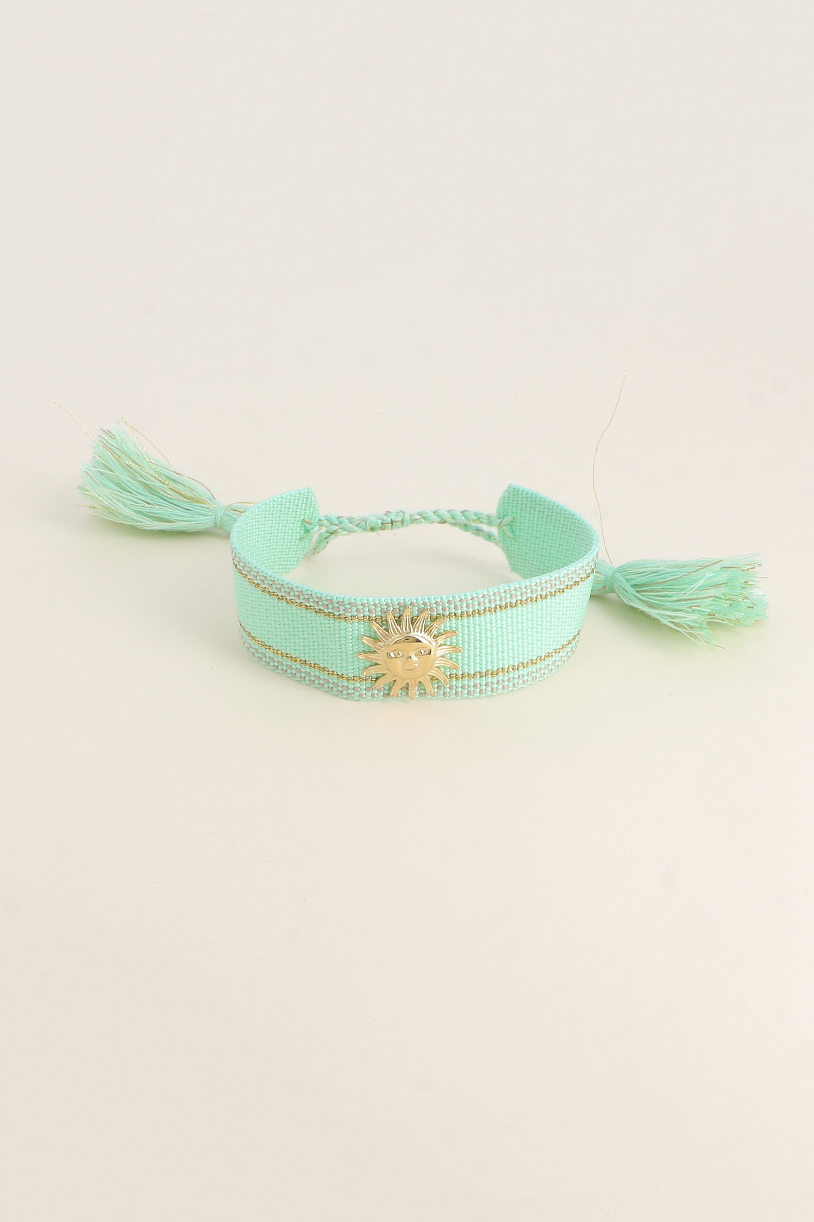 Mayorista Bohm - Pulsera corredera - pieza de tela y sol sonriente