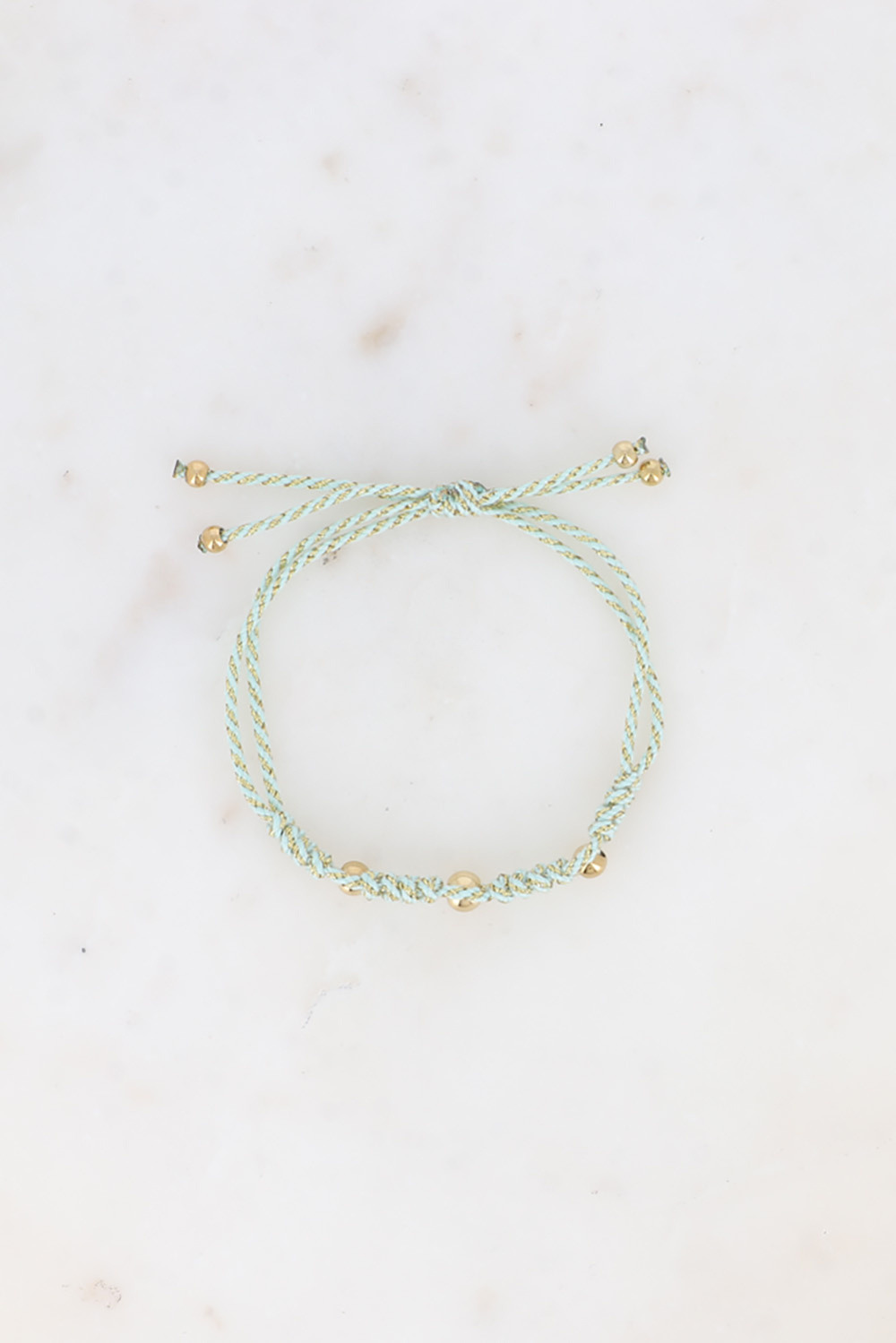 Wholesaler Bohm - Sliding bracelet on cord - braided pattern and steel pearls