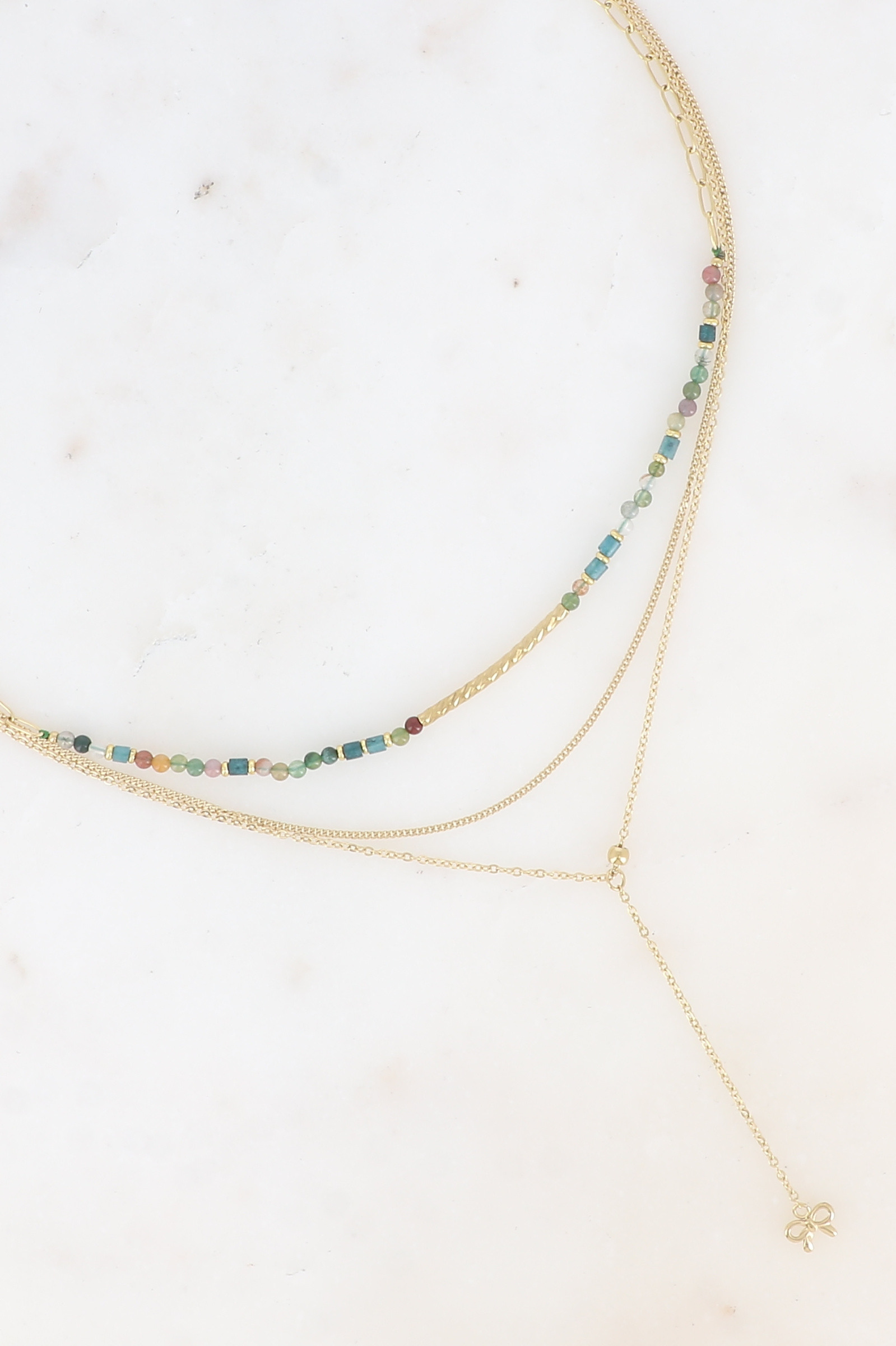 Grossiste Bohm - Collier multirangs - pierres naturelles et tube strié, noeud papillon