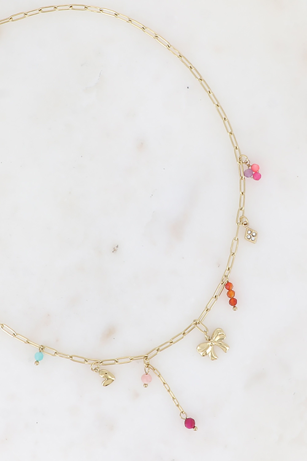Grossiste Bohm - Collier - noeud papillon, coeur, pierres naturelles et losange avec cristaux