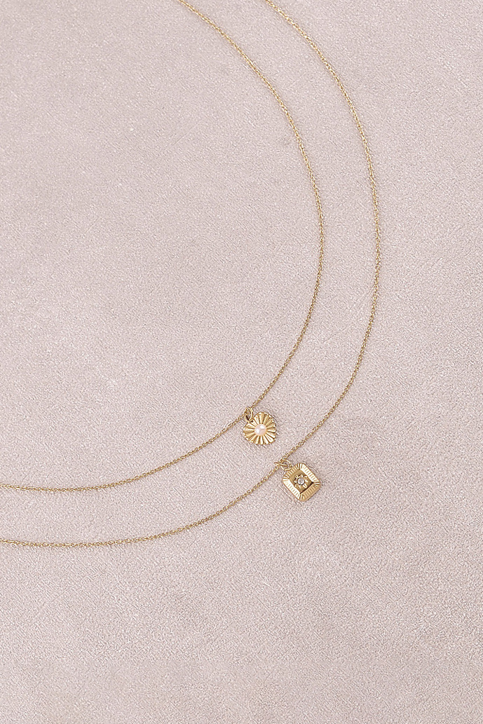 Grossista Bohm - Collana - 2 fili, cuore e sfera di resina bianca, medaglione rettangolare, stella e zircone