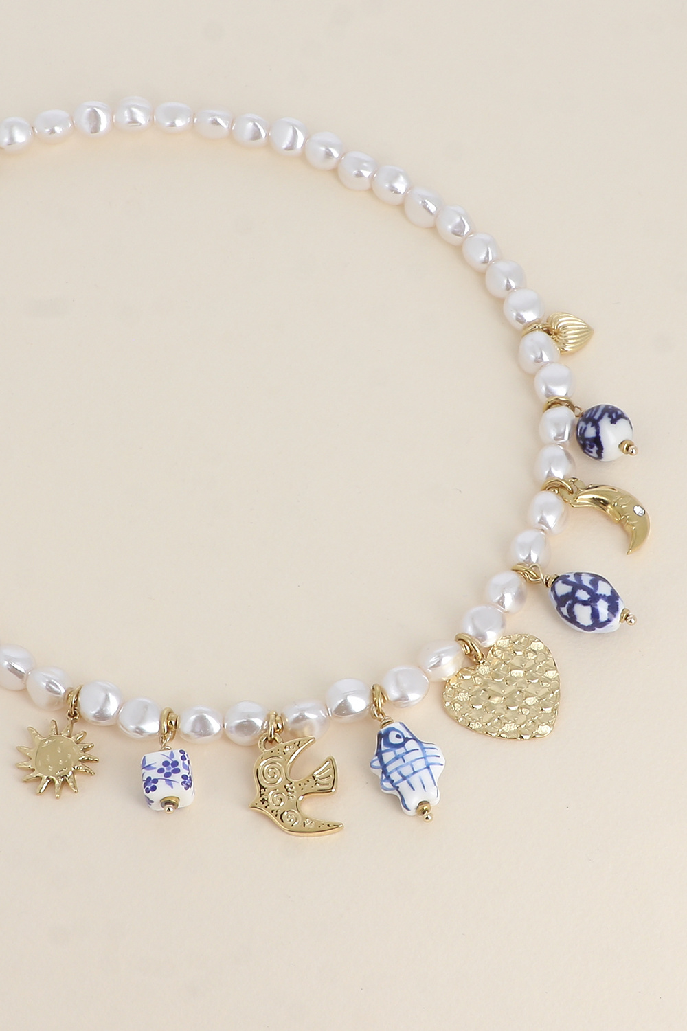 Grossiste Bohm - Collier sur fil - coeurs, soleil, oiseau, lune, perles en céramique émaillée