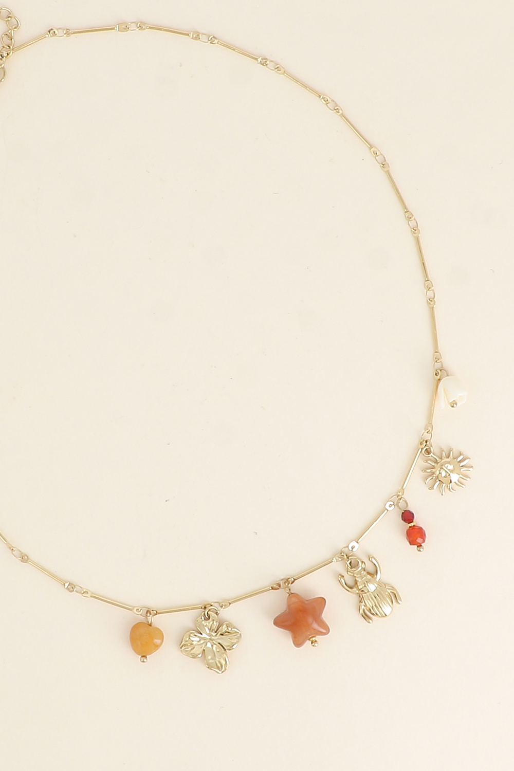 Grossiste Bohm - Collier - fleur, étoile en résine, pierres naturelles, scarabée, soleil