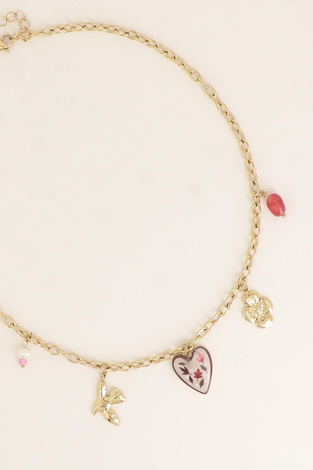 Grossiste Bohm - Collier - trèfle avec coeur, oiseau, perles en résine, coeur émaillé aux motifs feuillages