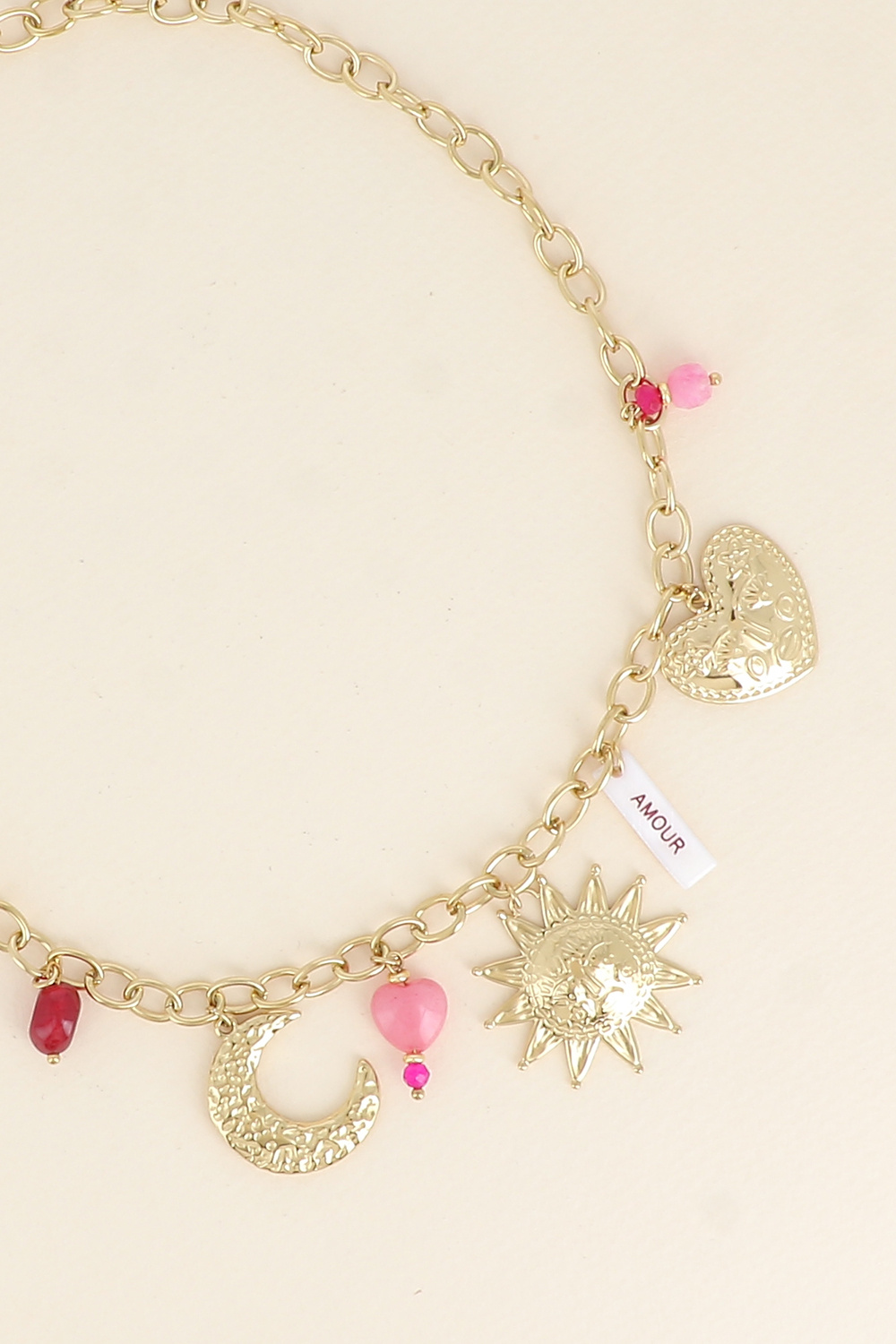 Grossiste Bohm - Collier - plaquette nacrée avec inscritpion "AMOUR" en émail, soleil, lune, coeurs