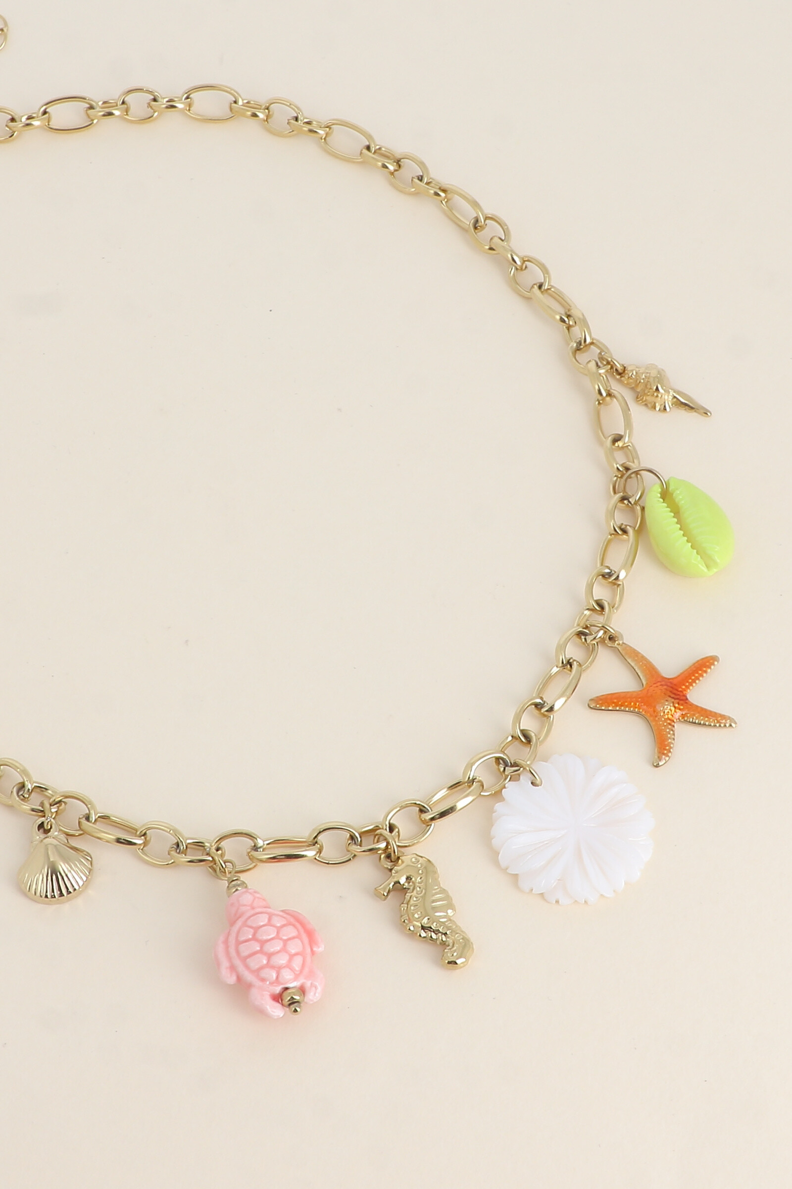 Mayorista Bohm - Collar: flor perlada, estrella de mar, tortuga esmaltada y cauri, conchas