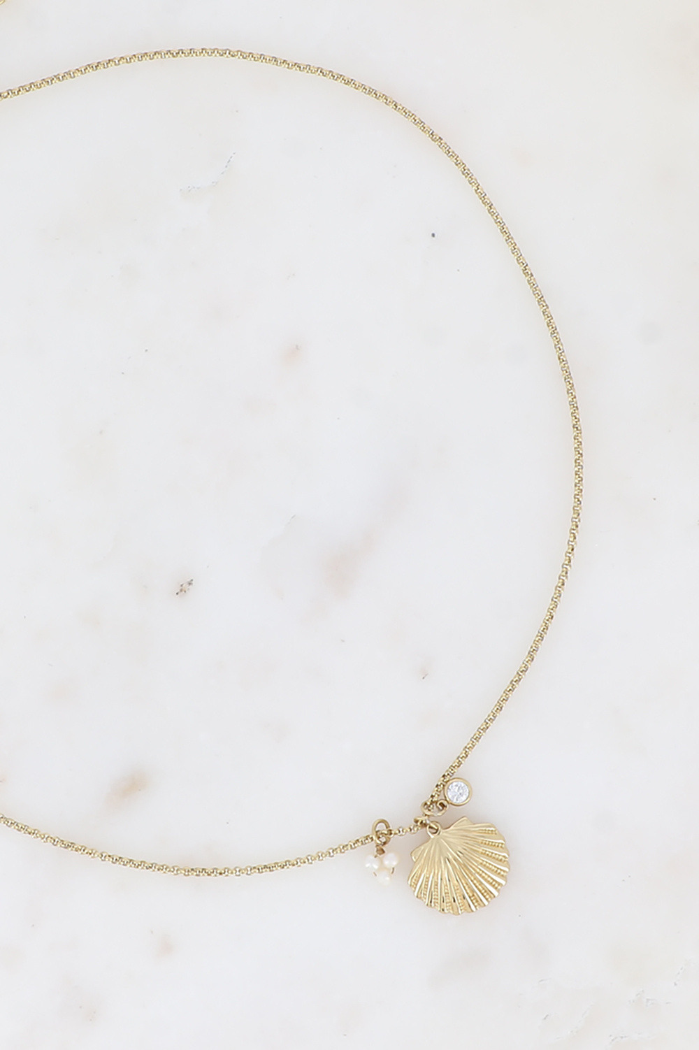 Grossiste Bohm - Collier - pendentif coquillage texturé, perles d'eau douce et cristal rond