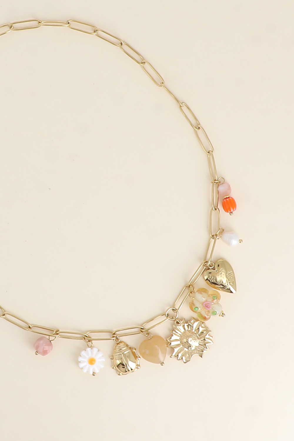 Mayorista Bohm - Collar - mariquita, flor de resina, corazón con cuentas, flor, corazón con flores grabadas