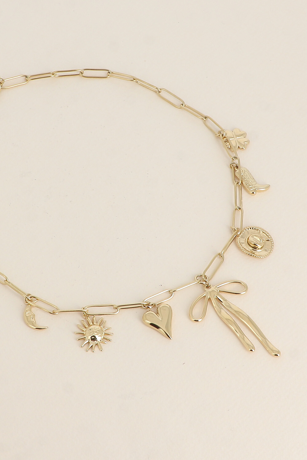 Grossiste Bohm - Collier - lune, soleil, coeur, noeud papillon, chapeau, botte, trèfle