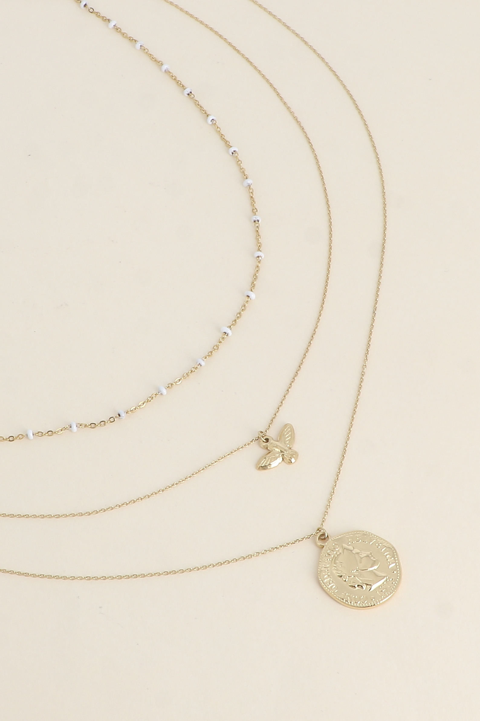Grossiste Bohm - Collier - 3 rangs, maille émaillée, oiseau et pièce de la Confédération Suisse
