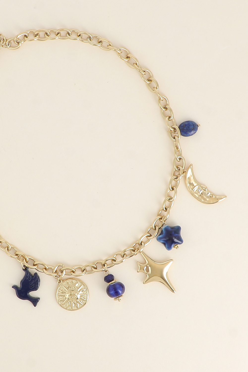 Grossiste Bohm - Collier - soleil, perles, lune, étoile et trèfle