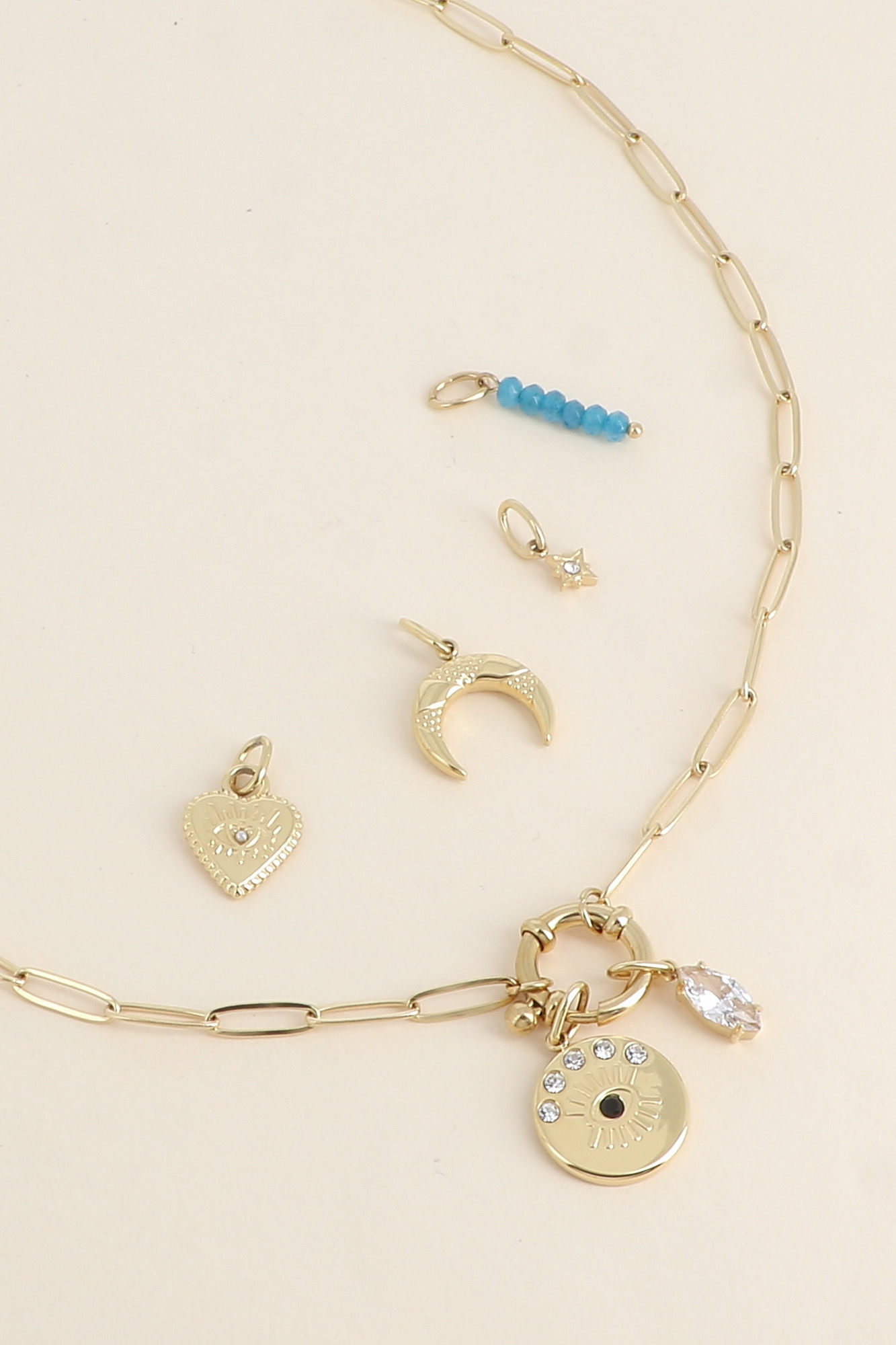 Grossiste Bohm - Cartelette CARPEDIEM Collier et 6 pendentifs (oeil et cristal)