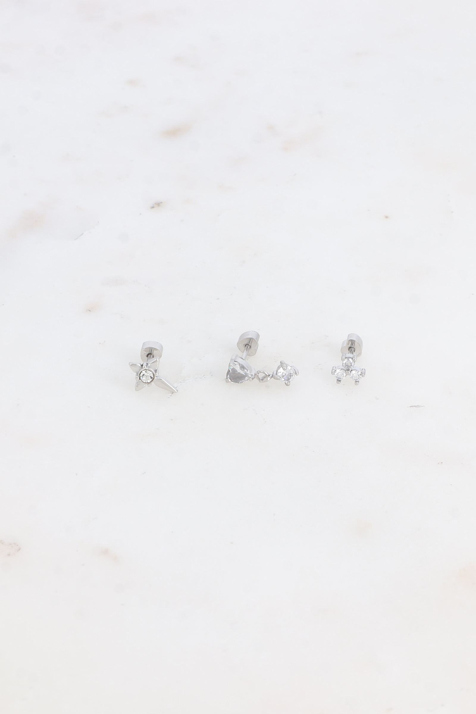 Großhändler Bohm - Set mit 3 Piercings - Kreuz, Herz und Kleeblatt