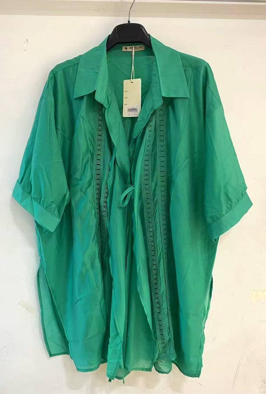 Sheer blouse with lace.