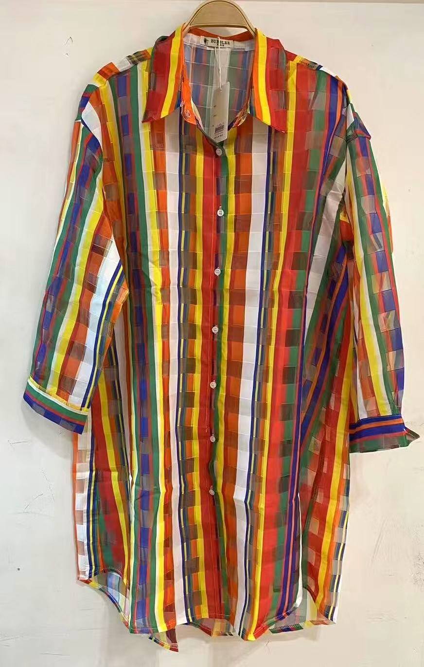 Printed blouse on checkered organza.