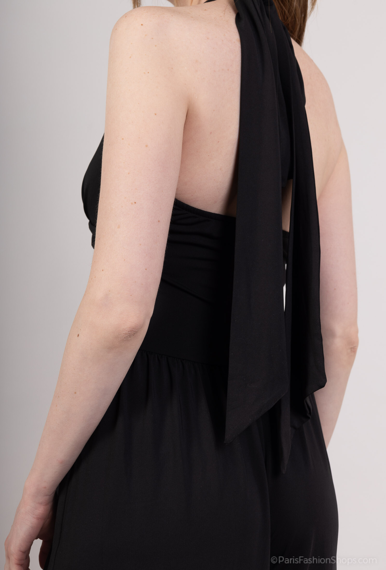 Combinaison pattes d'éléphant, idéale pour le printemps, en polyester et viscose, allie confort et élégance, fabriquée en Chine.