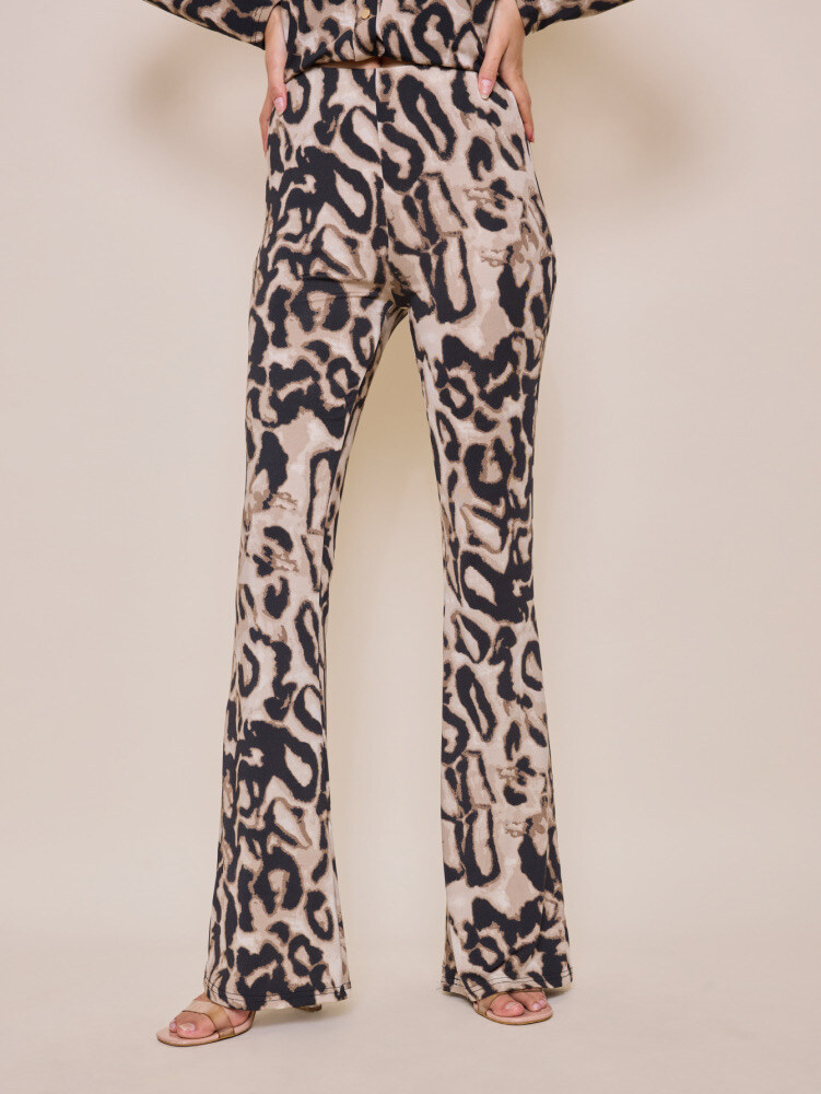 Pantalon évasé léopard, parfait pour l'automne/hiver, en polyester, viscose et élasthanne, importé de Chine.