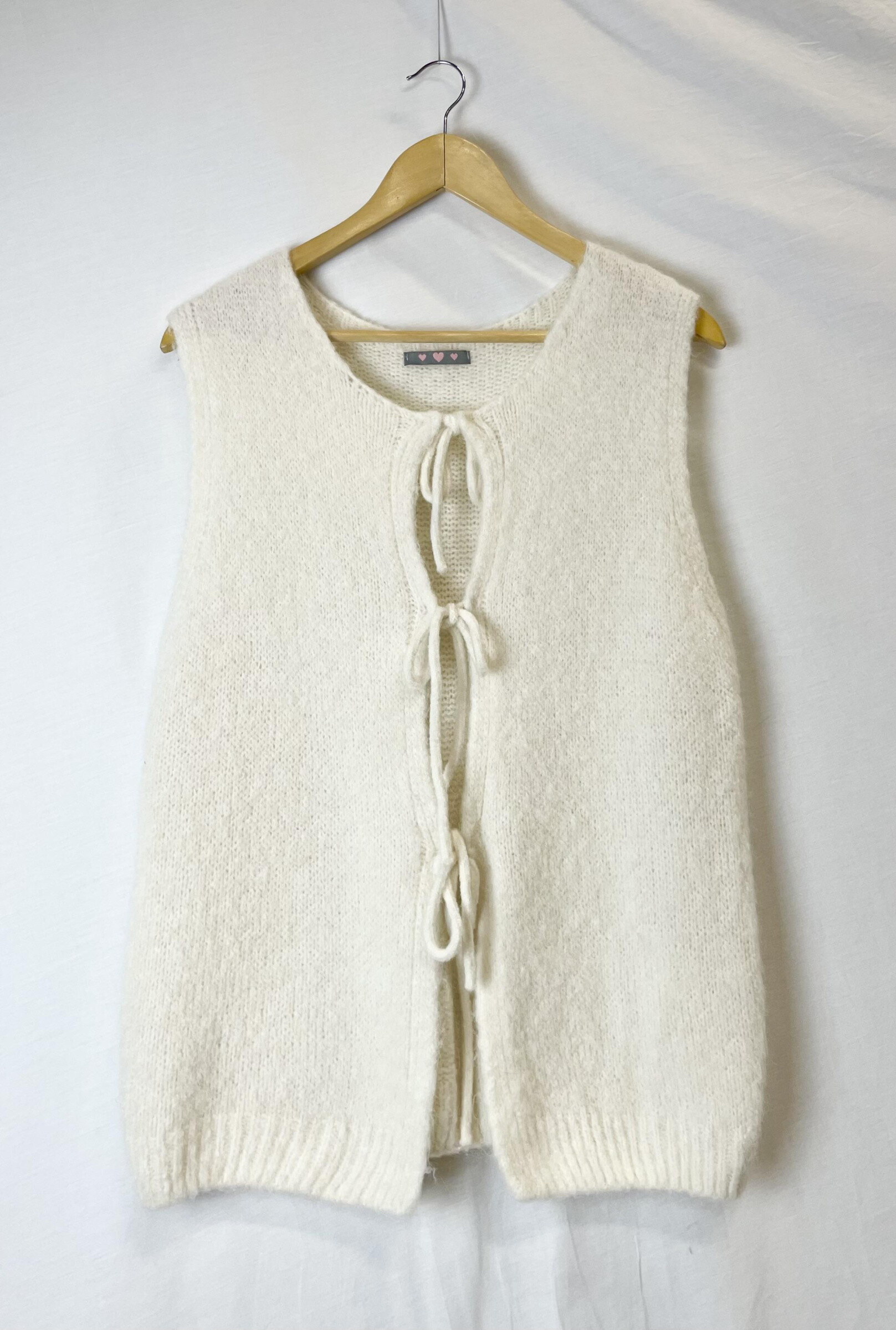Grossiste Catherine Style - Gilet maille à nouer à lacets, douillet à bébé alpaga mélanger