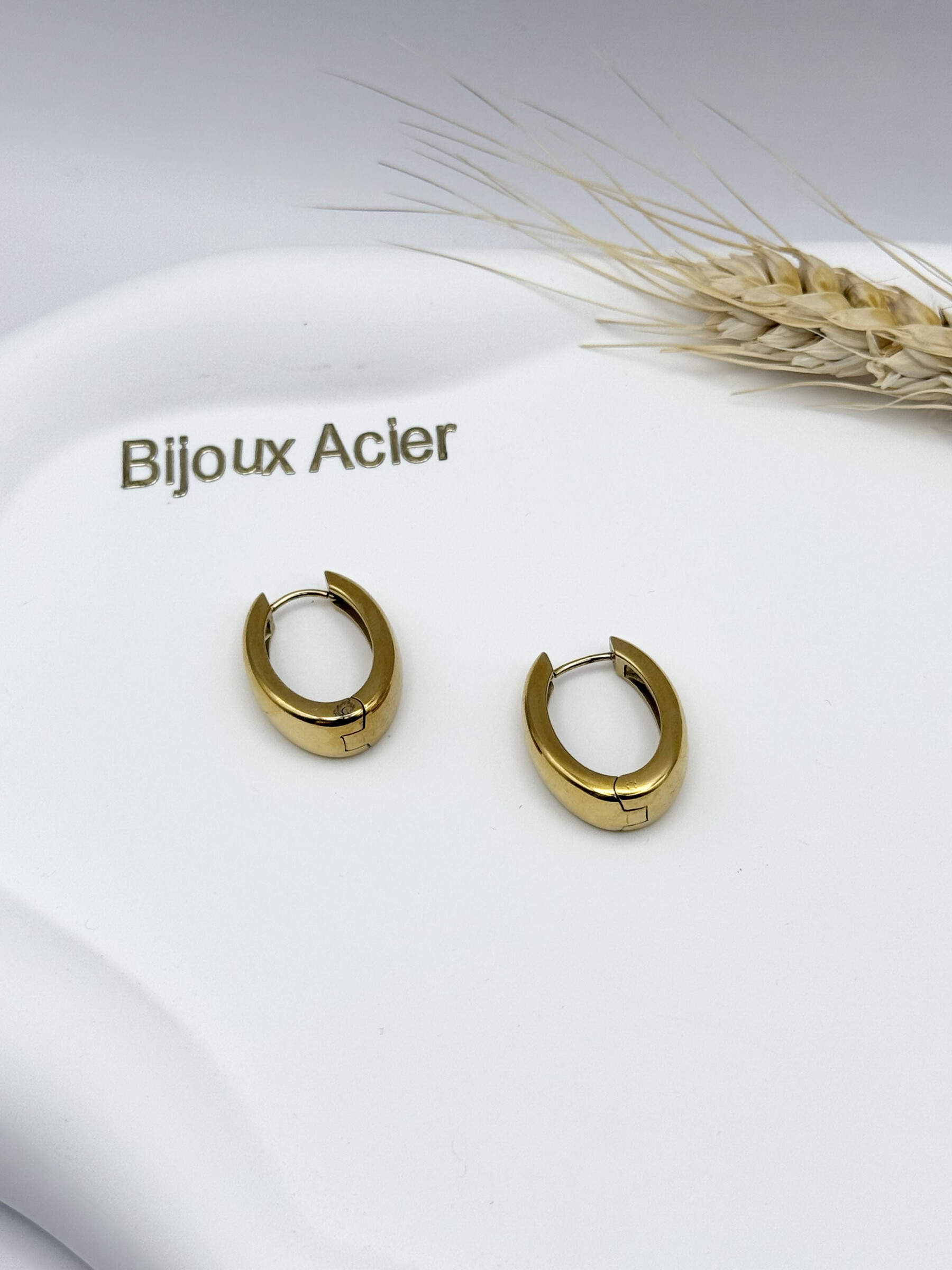 Wholesaler Ceramik - Stainless steel earrings motif female silhouette