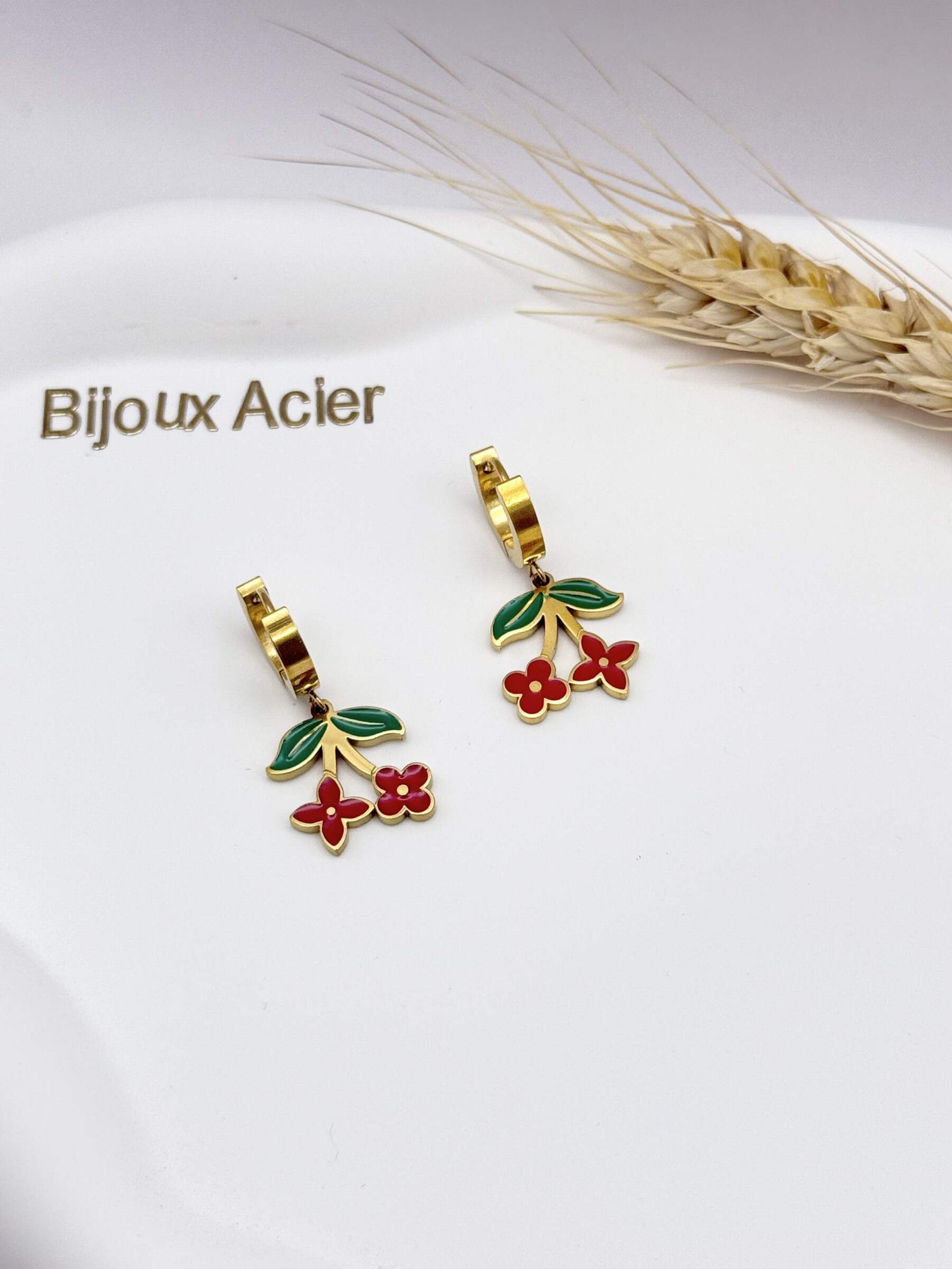 Wholesaler Ceramik - Stainless steel earrings motif female silhouette