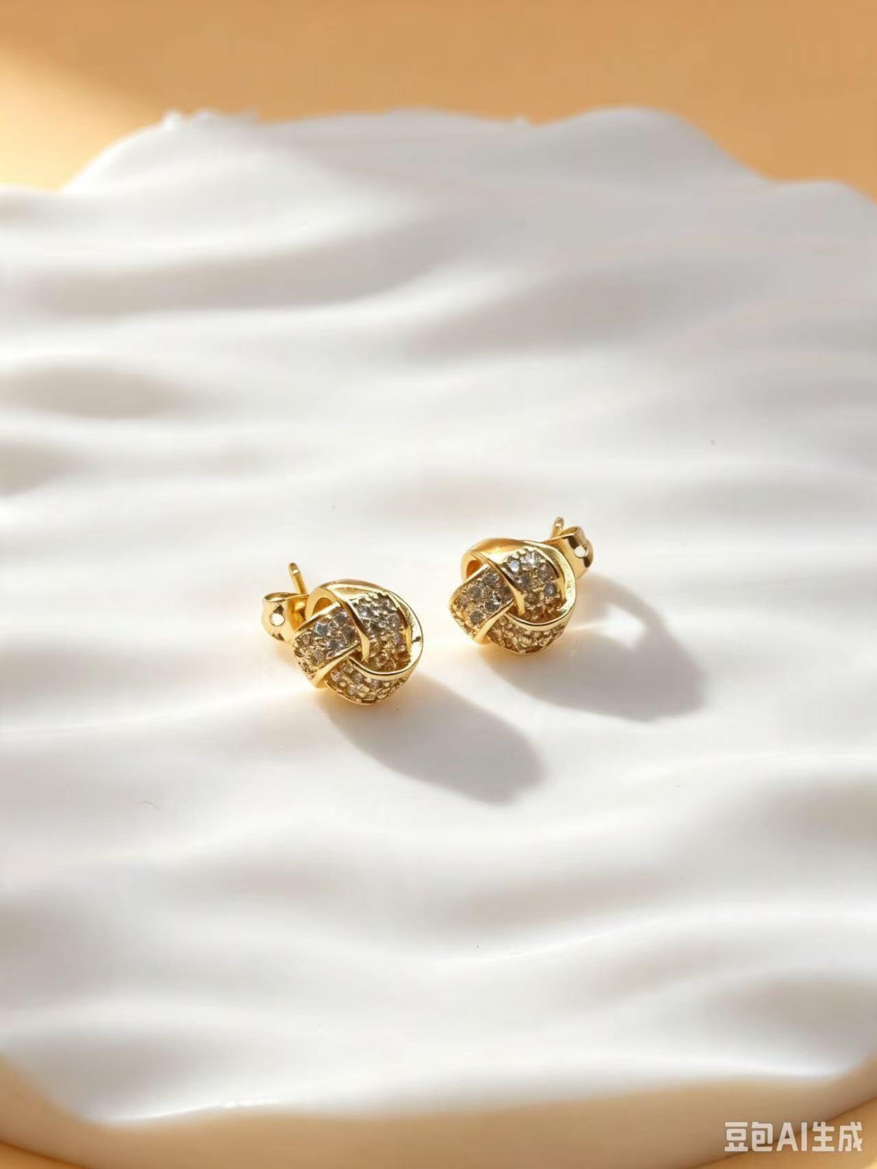 Grossiste Ceramik - Boucles d’oreilles boule nœud fantaisie doré strass