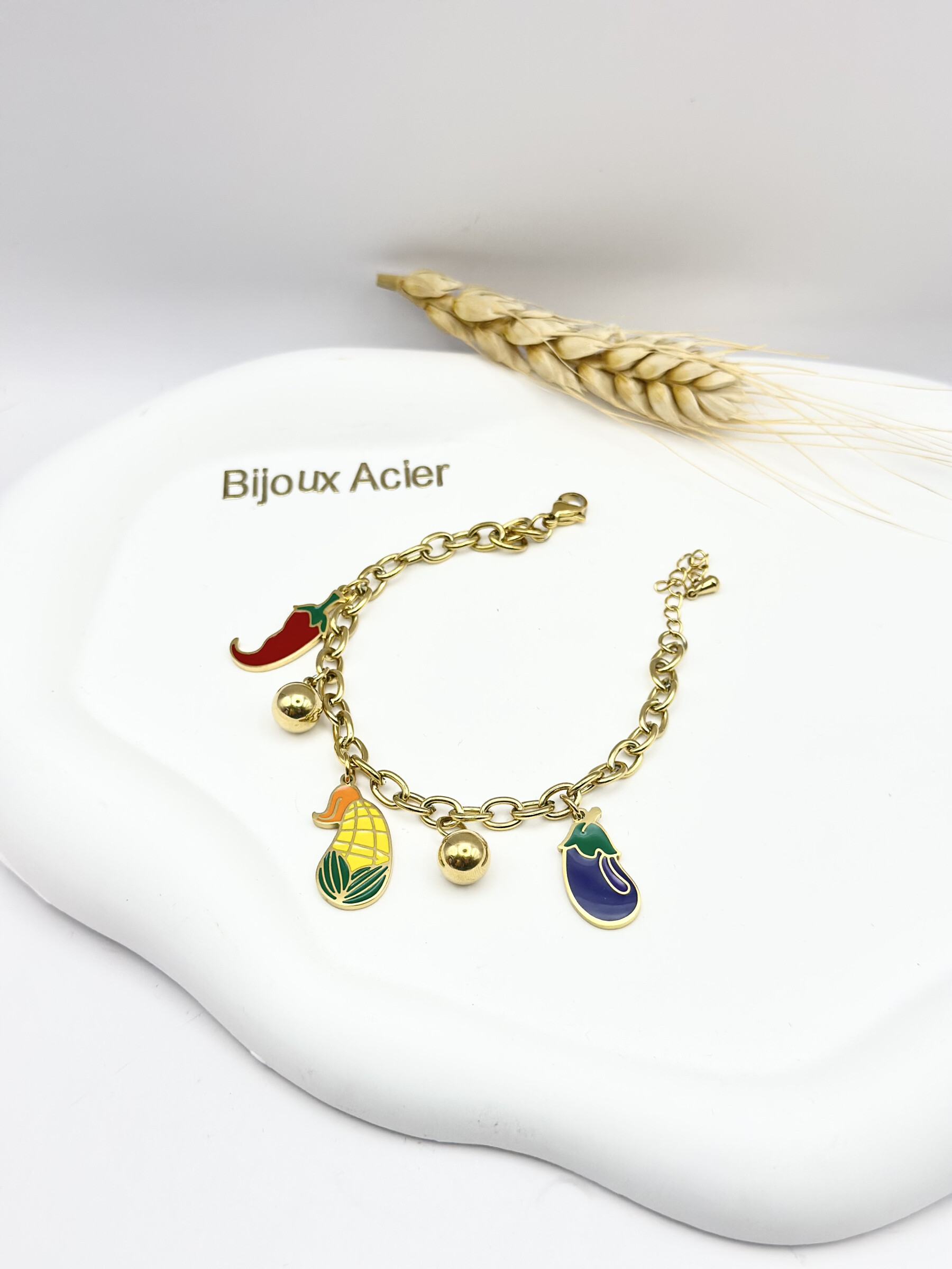 Grossiste Ceramik - Bracelet Charms Doré en Acier Inoxydable – Marché en Fête
