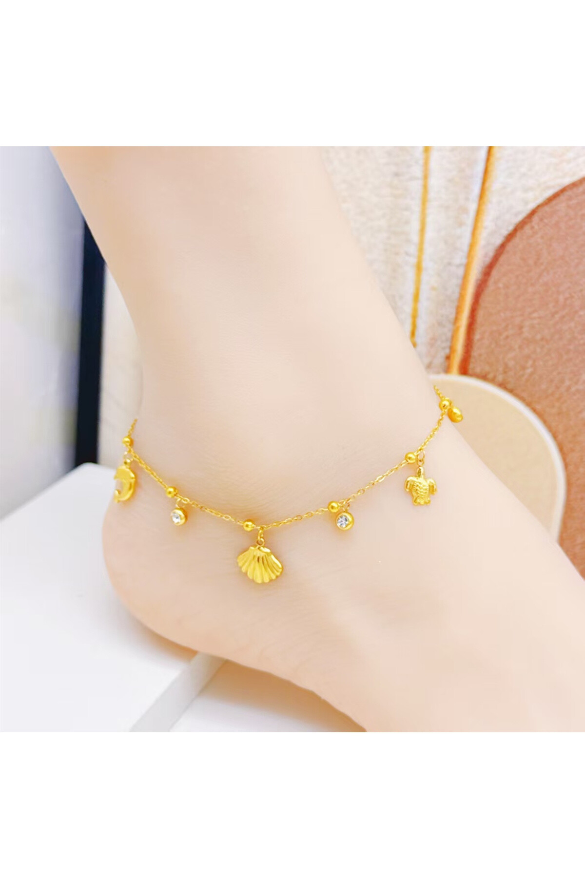 Wholesaler Ceramik - Golden anklet with marine charms Stainless steel