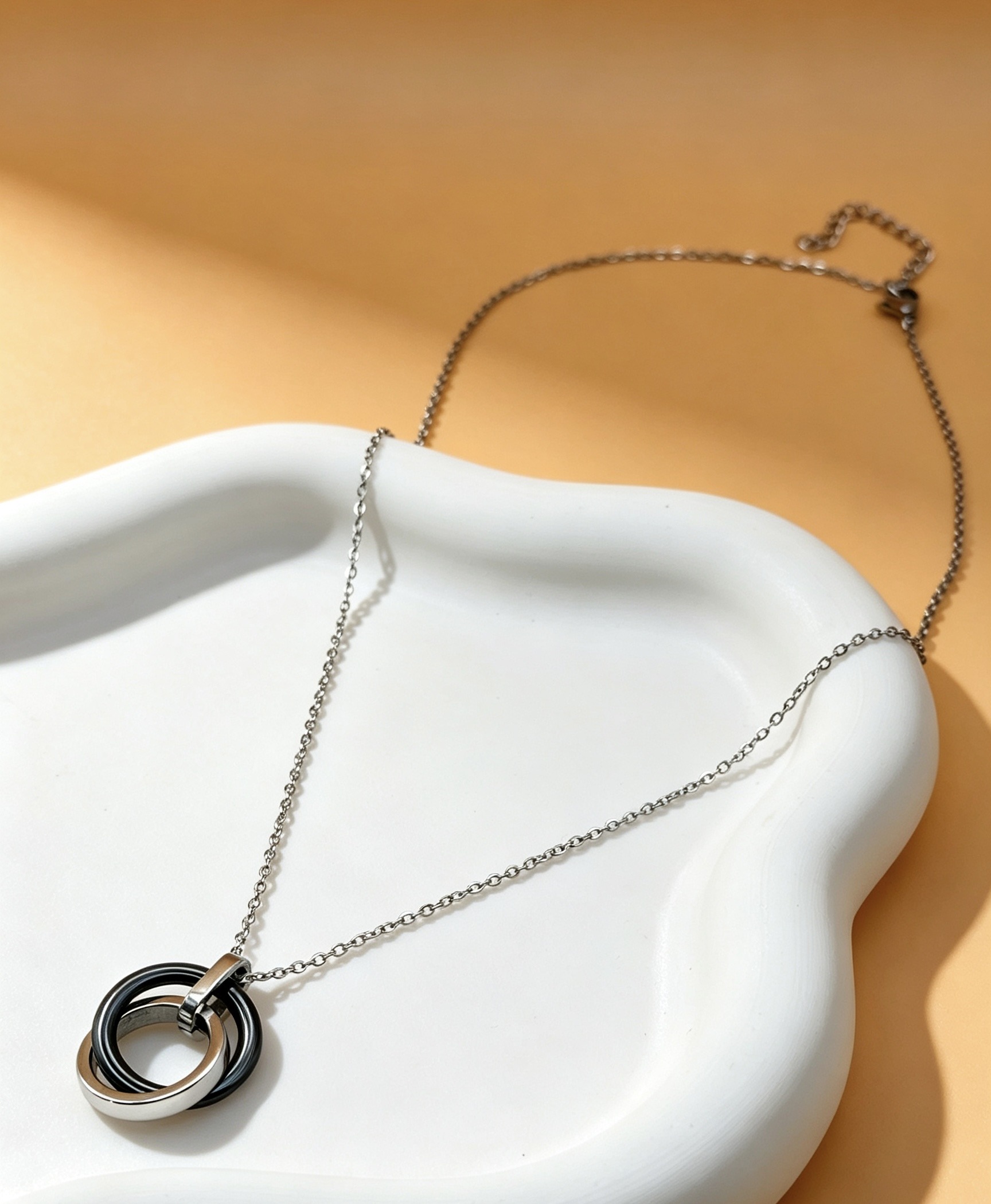 Mayorista Ceramik - Collar de doble anillo en acero inoxidable y cerámica
